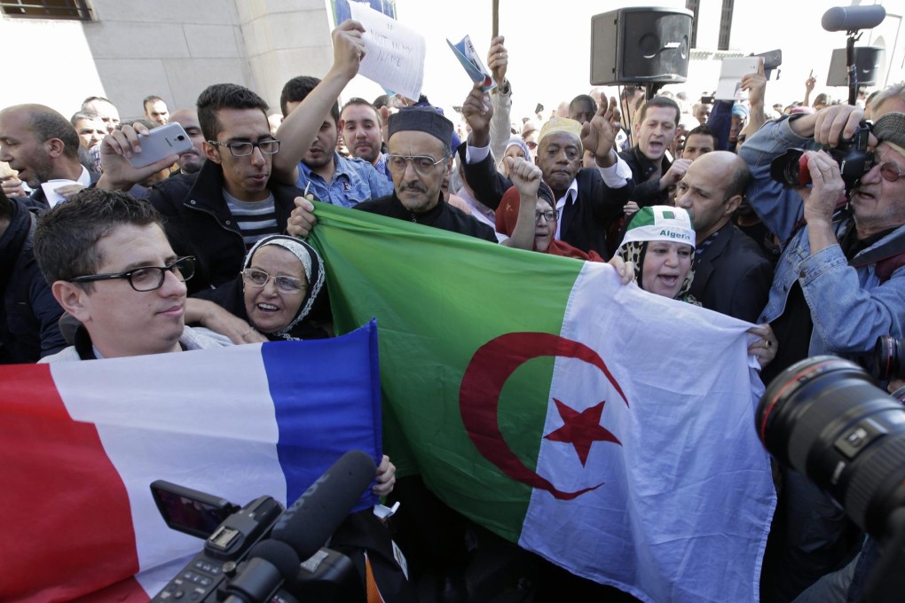 Muslims in Paris pay tribute to Herve Gourdel. Photo: Reuters