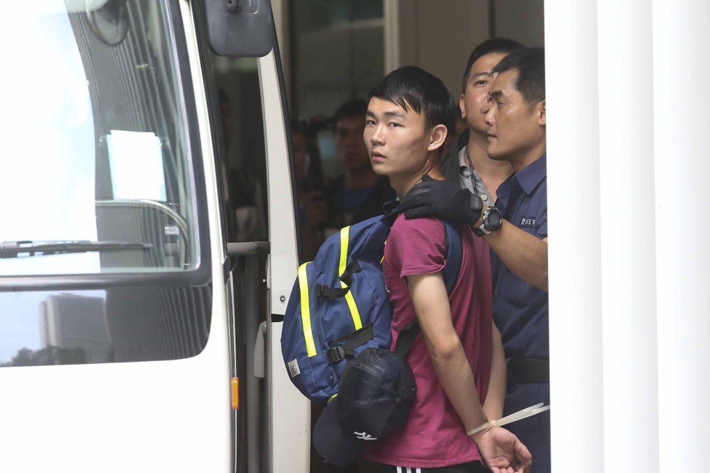 A student protester is taken into a police van in plastic handcuffs after being arrested on Saturday. Photo: SCMP