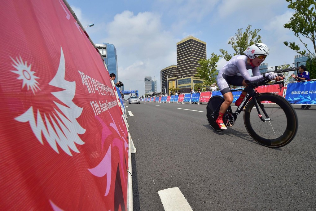 Hong Kong's Jamie Wong flashes past the finish on her way to a bronze medal in the women's individual time trial in Incheon. Photo: AFP