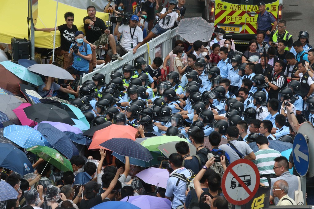 Demonstrators clash with police in Admiralty. Photo: K. Y. Cheng