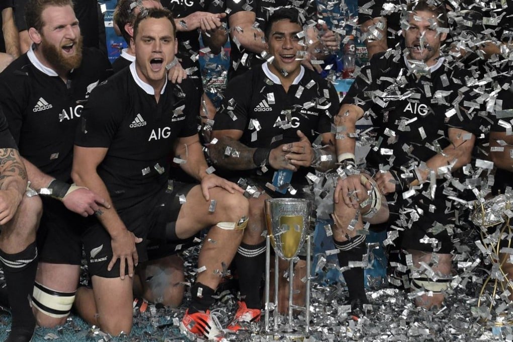 The All Blacks celebrate after defeating Los Pumas 34-13 on Saturday to win the 2014 Rugby Championship. Photo: AFP