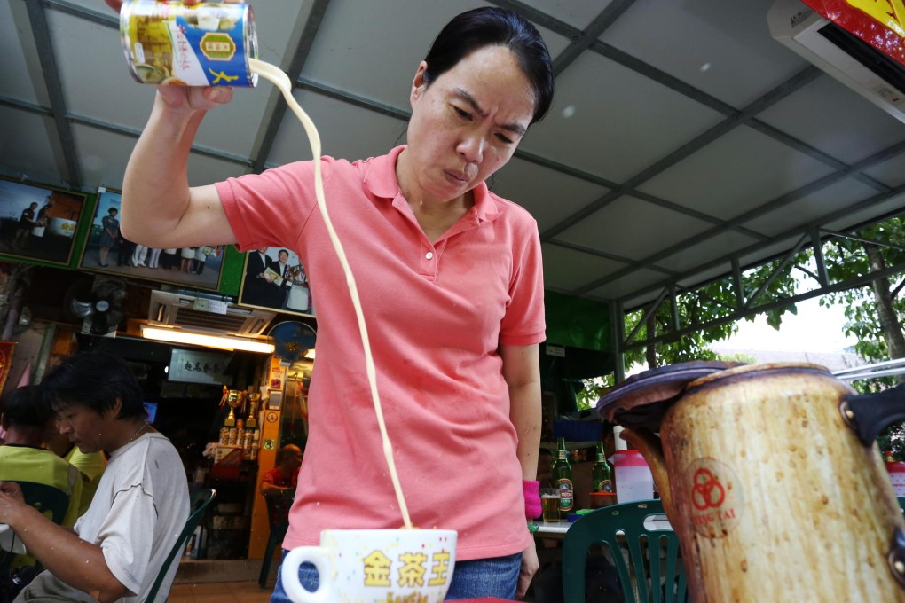 Terry Mok, winner of the "Kam Cha King" competition last year, showcases her skills at her cafe in Tai Wo. Photo: Nora Tam