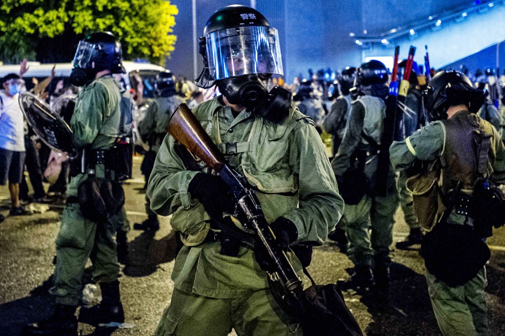 The government promised this day would be violent as long as 15 months ago, when Leung Chun-ying said it would be "impossible for it to remain peaceful". Photo: AFP