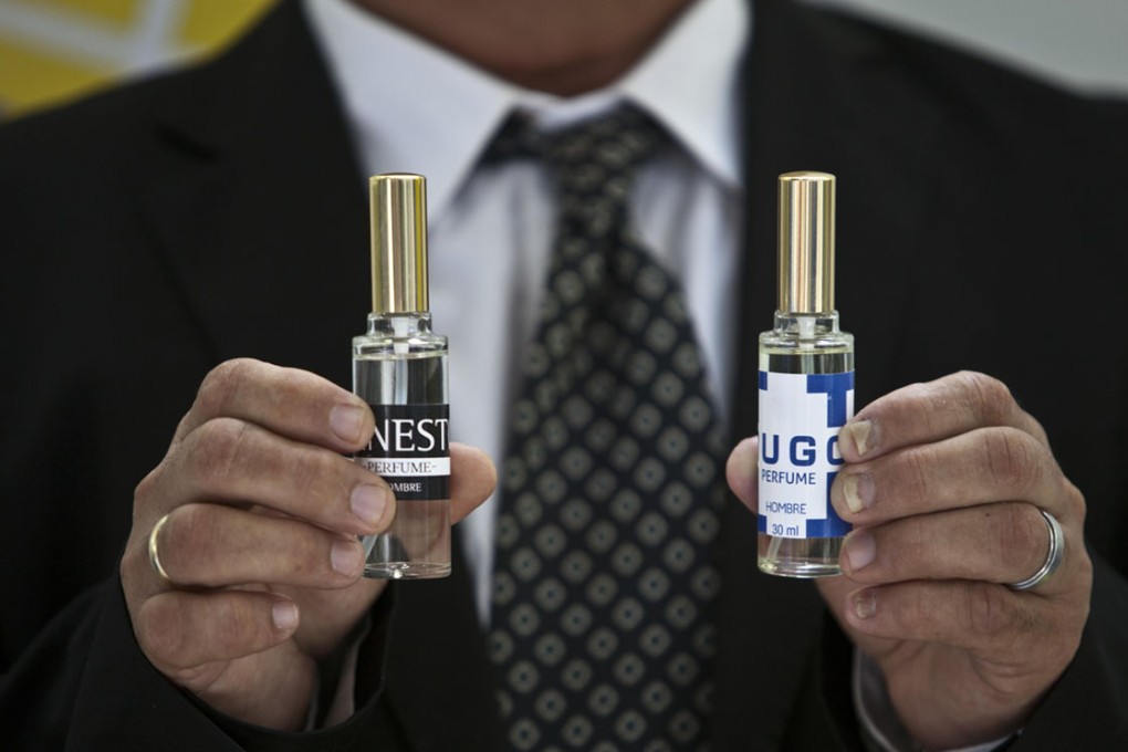"Ernesto" and "Hugo" colognes at a Havana trade fair. Photo: AP