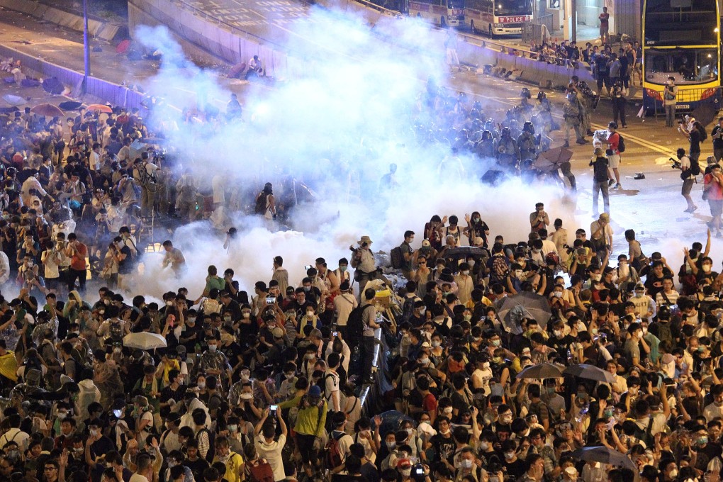 Police used pepper spray, batons and tear gas to disperse the protesters in Admiralty. Photo: Dickson Lee