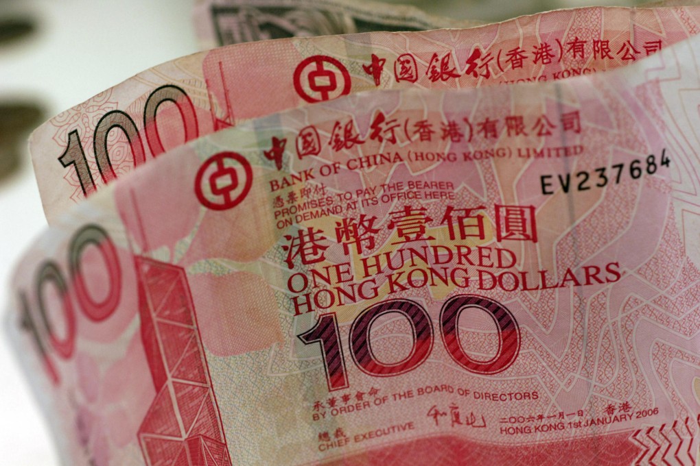 The Hong Kong dollar's 30-year peg to the US dollar has been seenas crucial to the economic stability of the city. Photo: Bloomberg