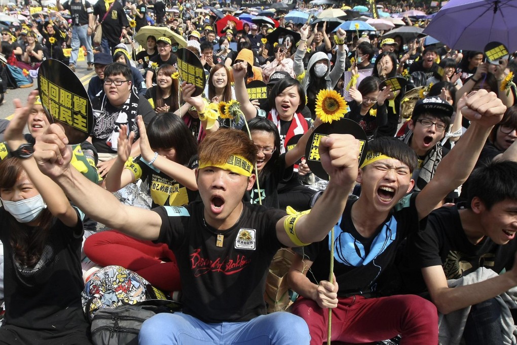 Students protest at Taipei's Legislative Yuan in March. Photo: AP