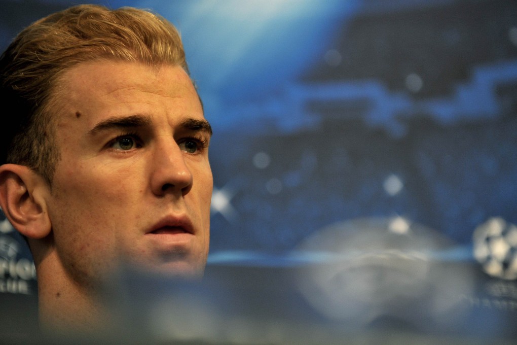 Joe Hart speaks to the media. Photo: AFP