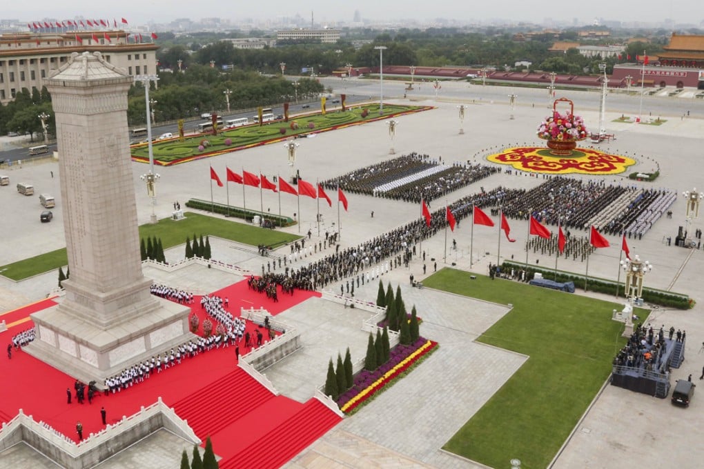 A ceremony was held to honour war dead at the Monument to the People's Heroes in Tiananmen Square. Photo: Xinhua