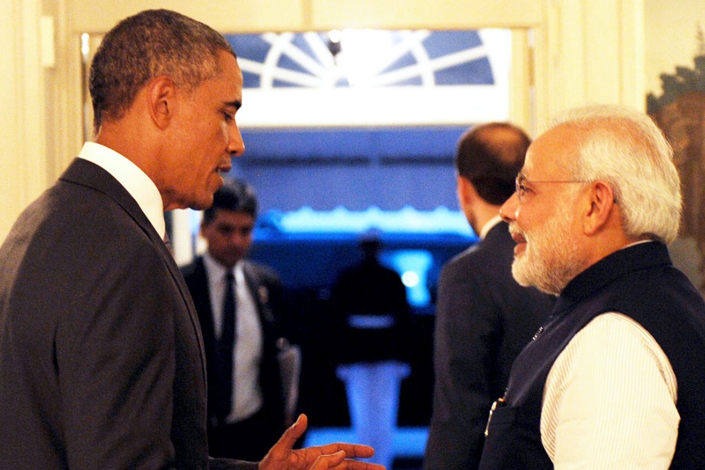 Indian Prime Minister Narendra Modi (right) listens to US President Barack Obama during his welcome to the White House in Washington, D.C. Photo: AFP