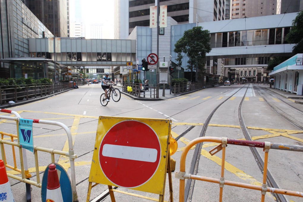Streets in Central remained clear of traffic - bar the odd bicycle - on Tuesday morning. Photo: Dickson Lee