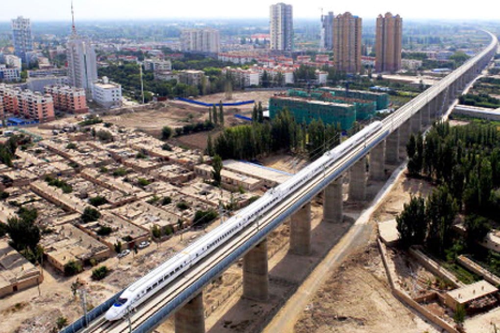 The Lanzhou-Xinjiang high-speed rail line involves 31 stations, one of which is Hami. This is a train on a trial run on September 14. Photo: Xinhua