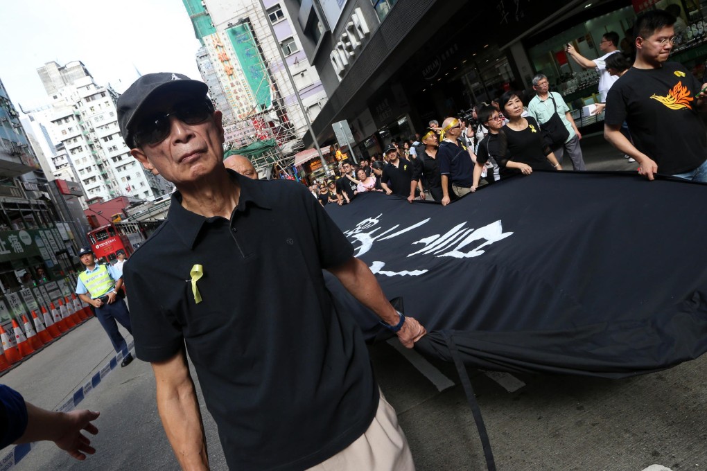 Martin Lee Chu-ming was urging protesters to stay calm from a hastily assembled stage in Harcourt Road, Admiralty, when the first rounds of tear gas were fired at protesters.