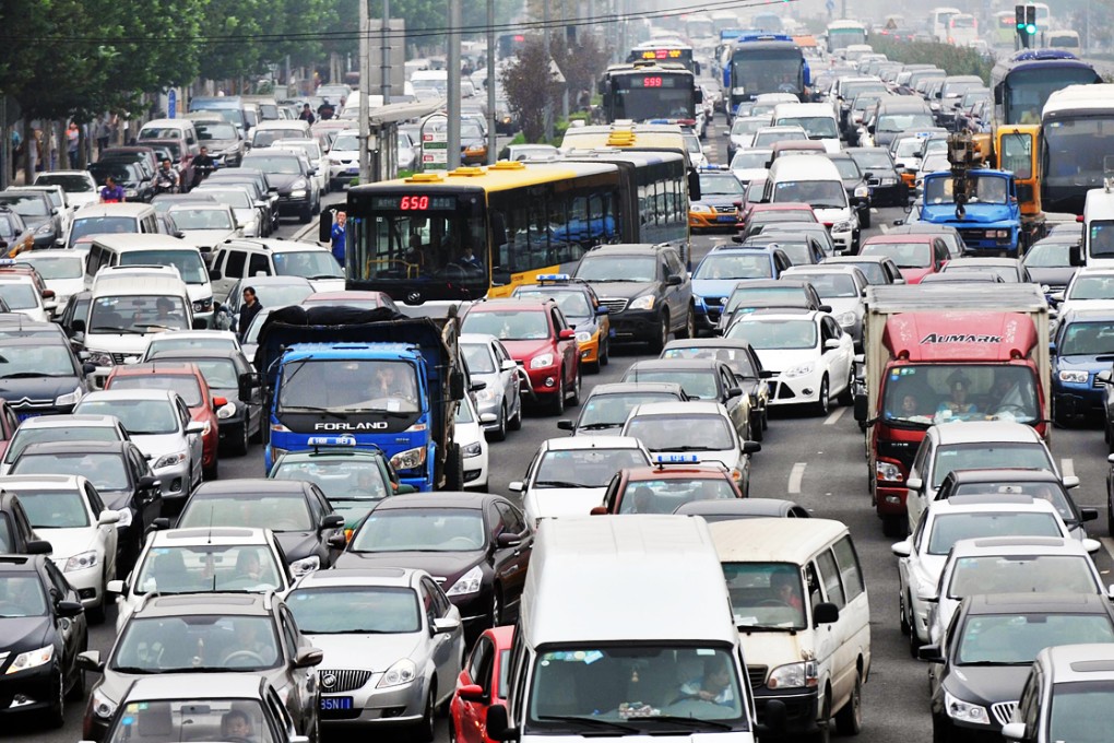 Beijing's pollution problem became so bad that, once the number of vehicles on the roads hit five million, municipal officials began a lottery for number plates. Photo: Xinhua