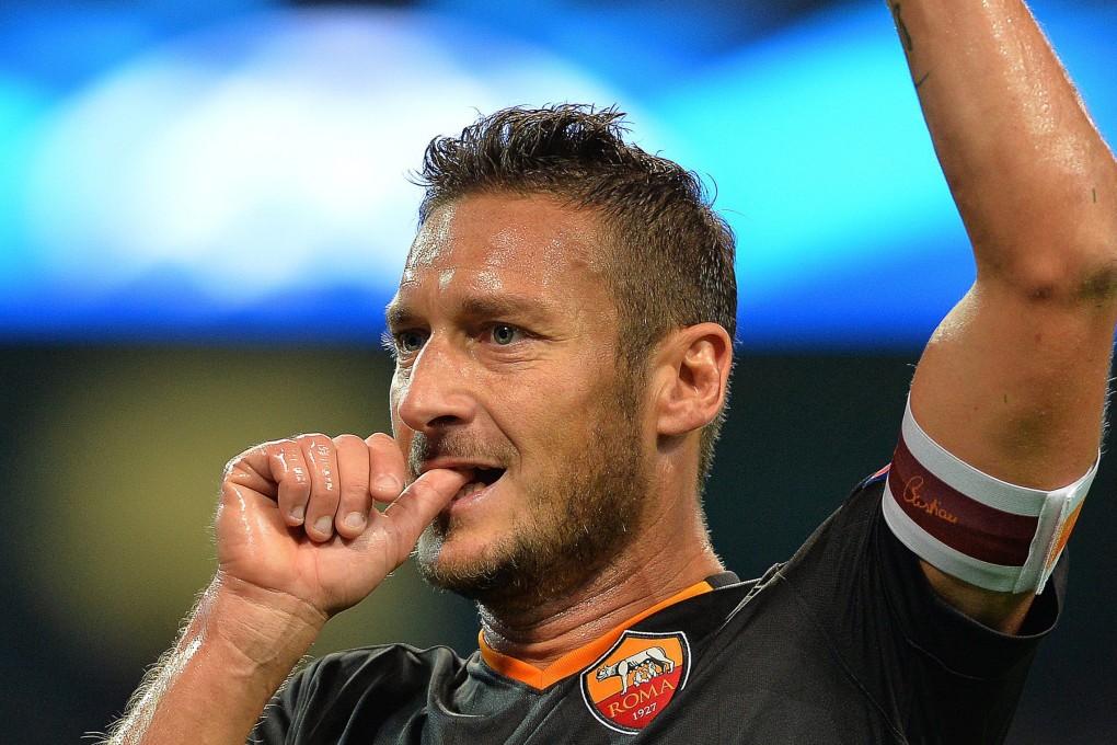 AS Roma's 38-year-old Francesco Totti celebrates after scoring the equaliser during their Champions League draw with Manchester City at the Etihad Stadium. Photo: EPA