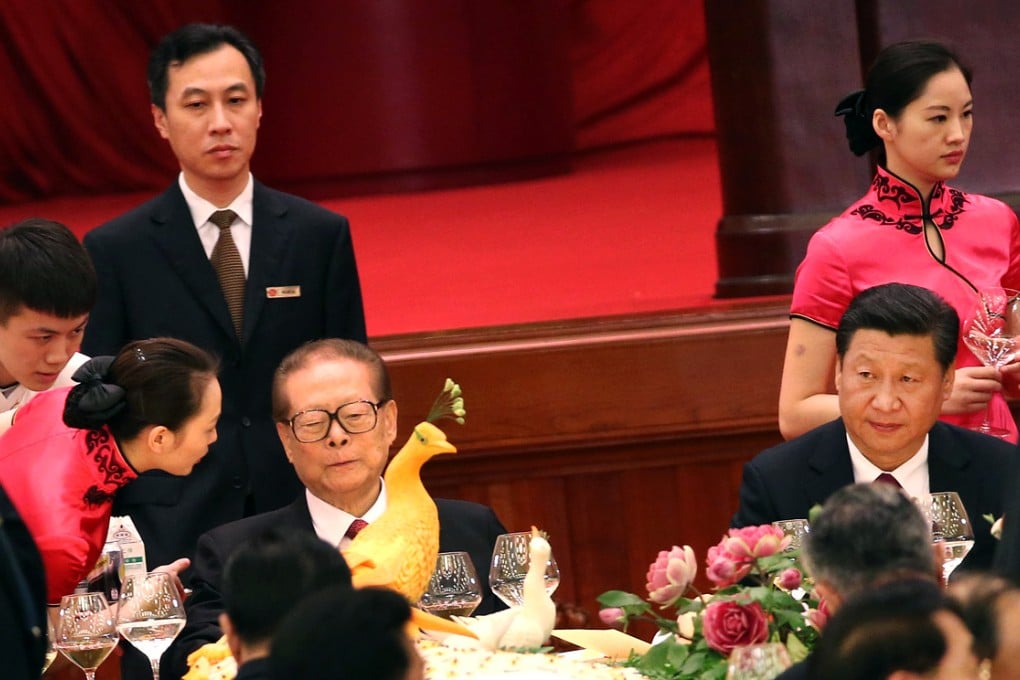 President Xi Jinping (right), with his predecessors and other past and present party leaders, attends the National Day gathering in Beijing yesterday. Photo: EPA