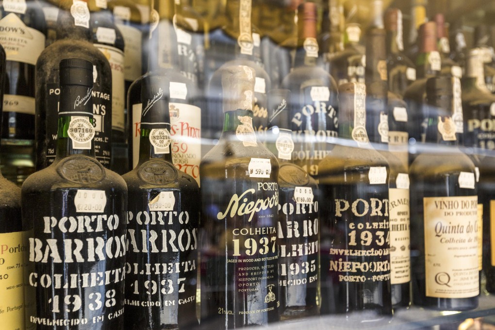 Bottles of vintage port in a window in Lisbon, Portugal. Photo: Corbis