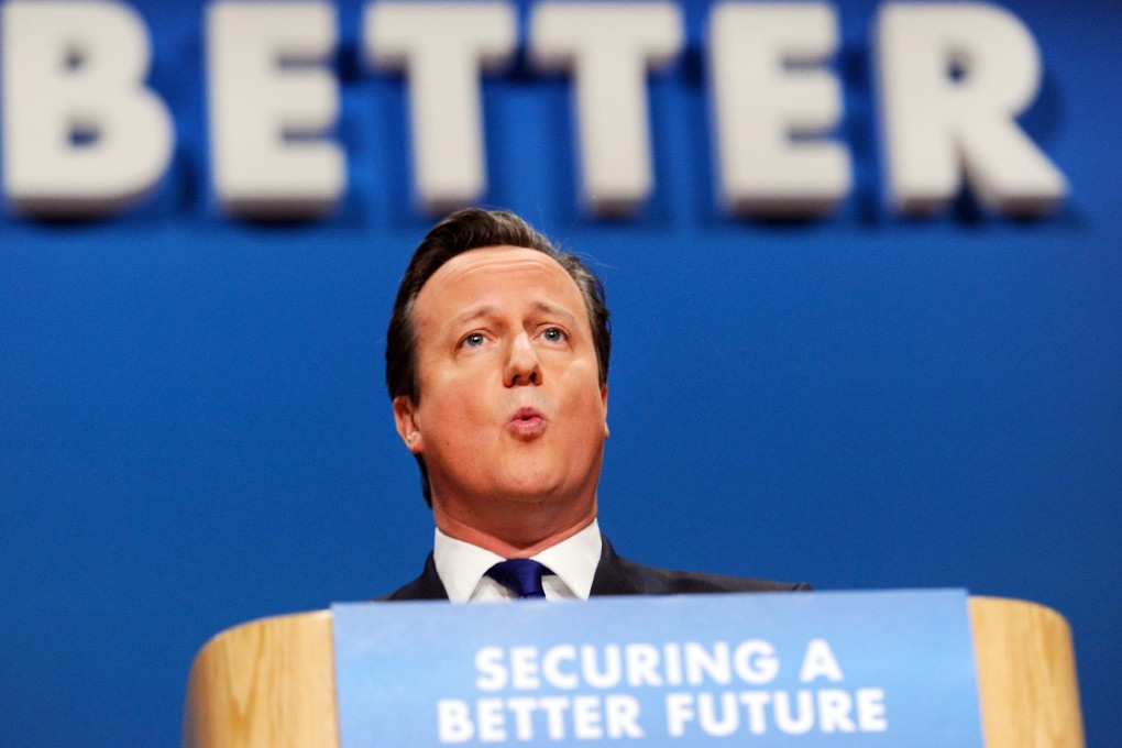 David Cameron vowed to change the system so that people working 30 hours a week on the national minimum wage would pay no income tax. Photo: EPA