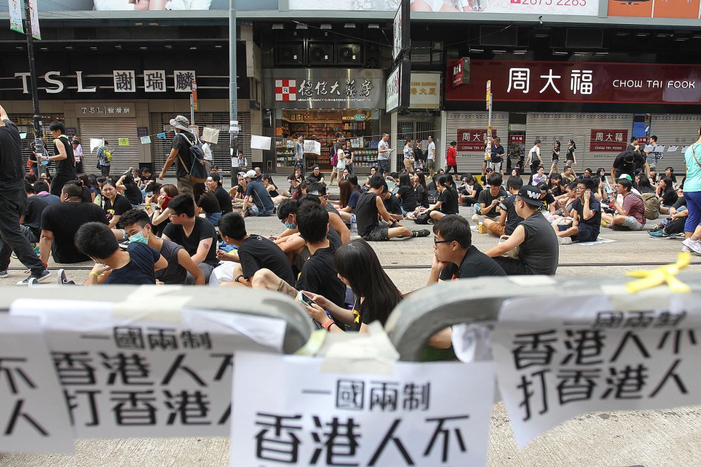 Business risks a backlash. Photo: May Tse