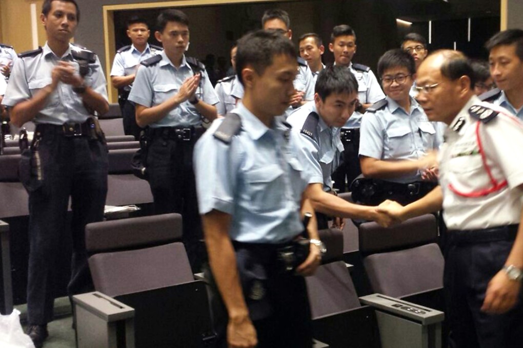Tsang Wai-hung, Commissioner (front Right) of Police meeting with police officers.