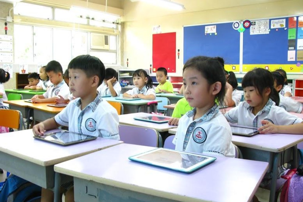 Students at Baptist Rainbow Primary School use tablets and iPads from their first year.