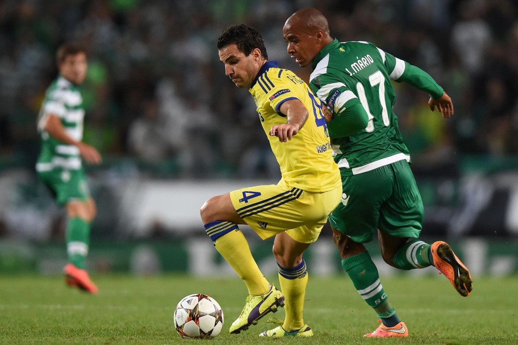Cesc Fabregas (left) vies with Sporting’s Fredy Montero in Chelsea's Uefa Champions League group G match. Photo: AFP