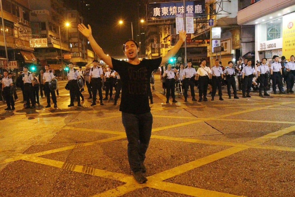 Police officers on guard in Mong Kok yesterday.Photo: Dickson Lee