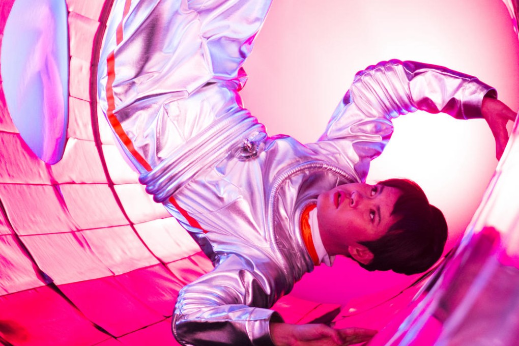 Ming Wong as an astronaut.