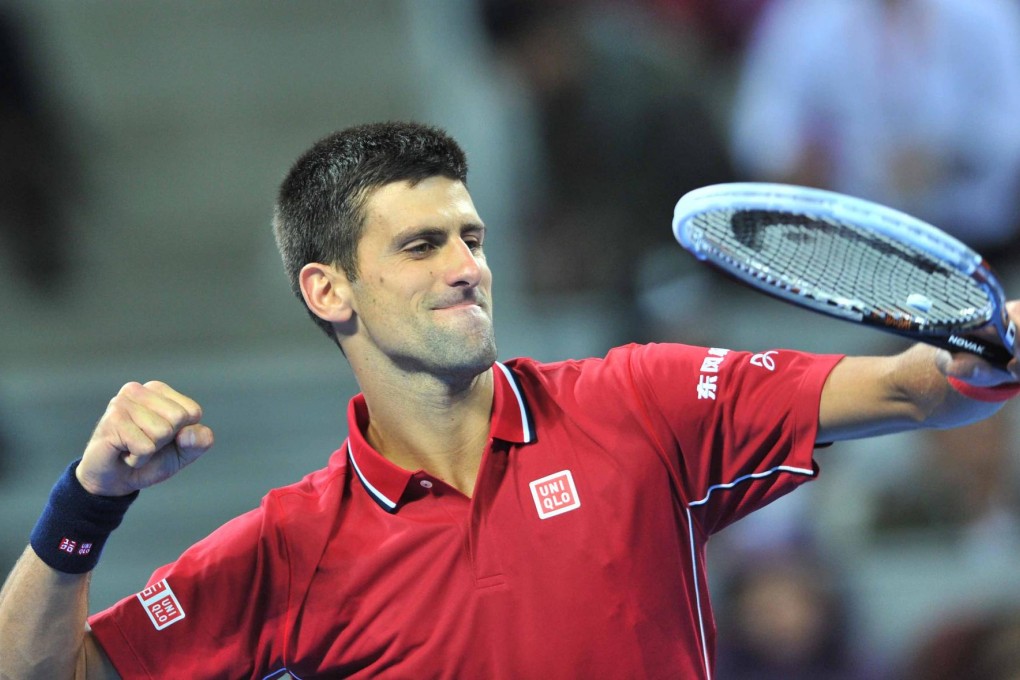 Novak Djokovic celebrates his victory in Beijing. Photos: Xinhua