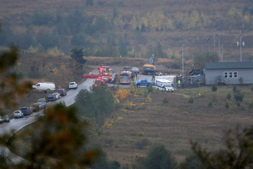 Emergency personnel respond to a structure fire that leveled administrative buildings at the Flight 93 National Memorial near Shanksville. Photo: AP