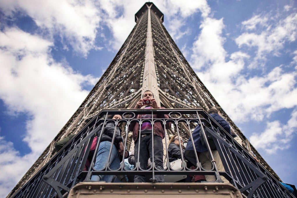 The Eiffel Tower in Paris attracts some seven million visitors a year, of whom 85 per cent are foreign tourists. Photo: AFP