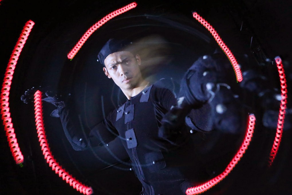 Martial arts student Robert Law wears a motion-capture suit to record the movements of styles in 3D. Photo: Felix Wong
