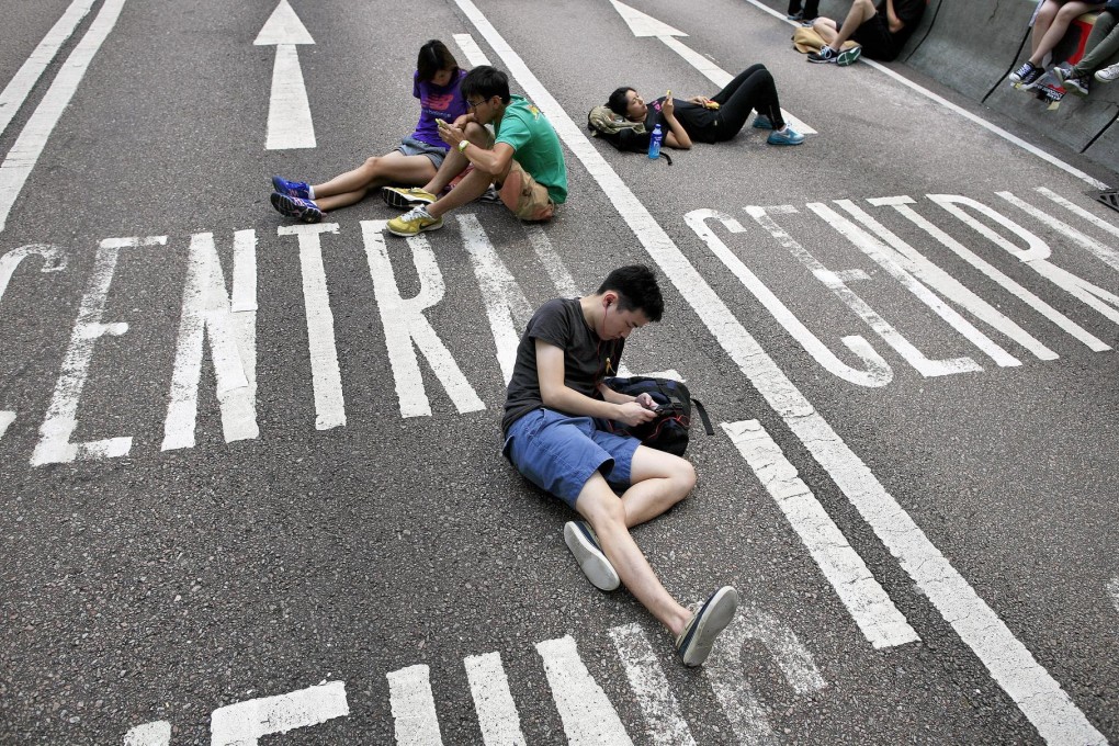 The stock exchange, in seeking to allay the concerns, says the pro-democracy protests should not affect the through train. Photo: EPA