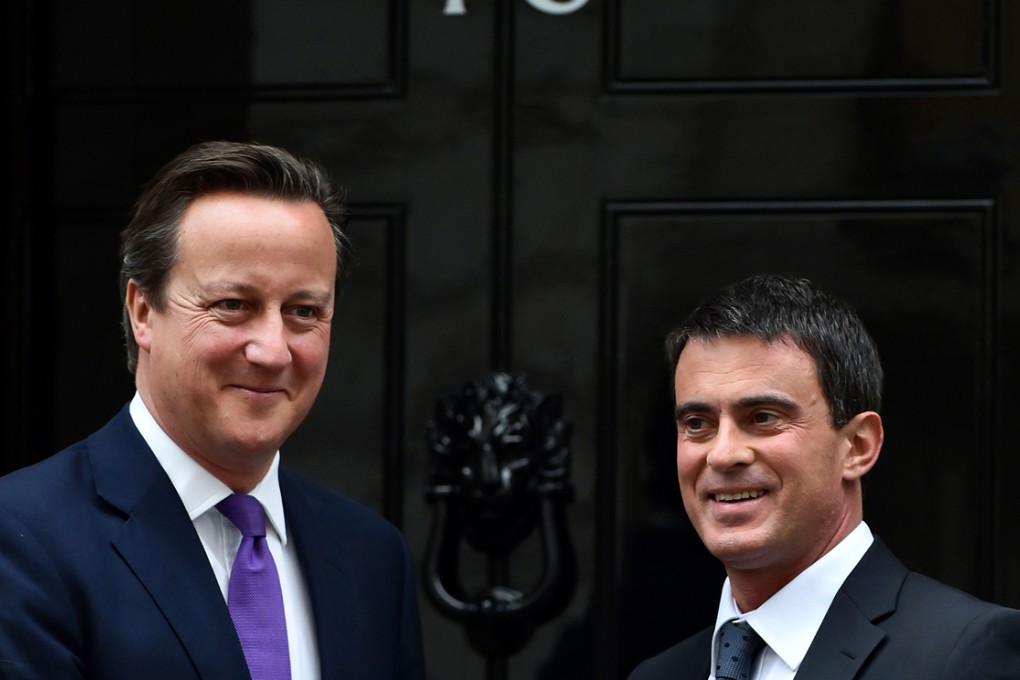 British Prime Minister David Cameron (left) meets French Prime Minister Manuel Valls outside 10 Downing Street in London. Photo: AFP