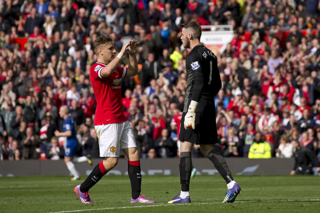 David de Gea is congratulated by Luke Shaw on Sunday. Photo: AP