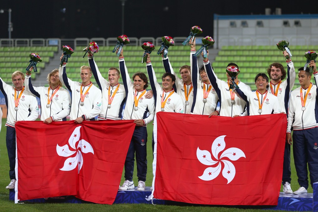 Silver medalists players of China's Hong Kong pose on the podium during the awarding ceremony of the men's rugby contest at the 17th Asian Games in Incheon, South Korea. Photo: Xinhua