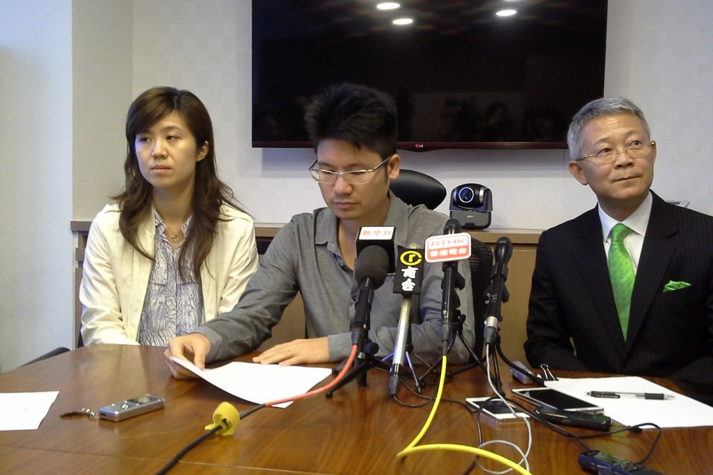 Restaurant owner Raymond Liu (centre) said he joined the anti-Occupy protests because the civil disobedience movement affected his businesses. Photo: Shirley Zhao