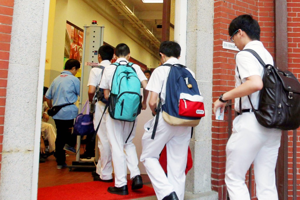 Pupils return to King’s College yesterday. Photo: SCMP Pictures
