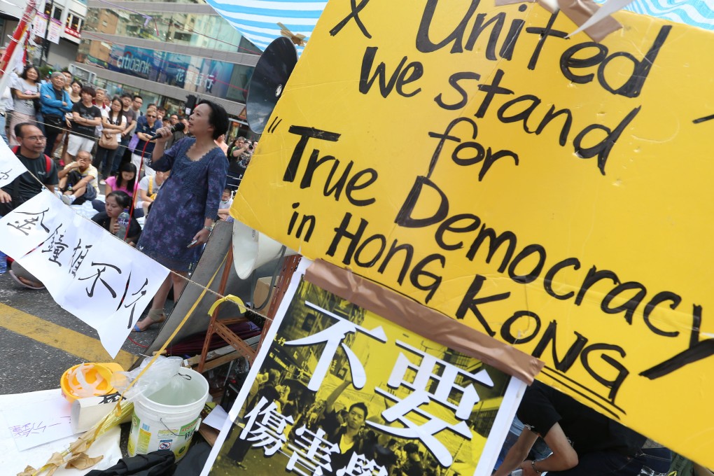 Over the past week tens of thousands of protesters have demanded that Hong Kong's Chief Executive Leung Chun-ying quit and that Beijing allow the city the right to vote for a leader of its choice in 2017 elections. Photo: K. Y. Cheng