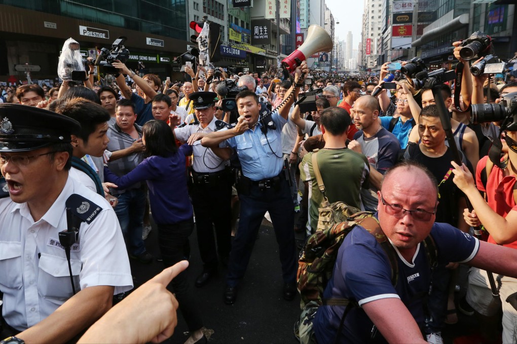Police and protesters clash in Mong Kok last week. Photo: Sam Tsang