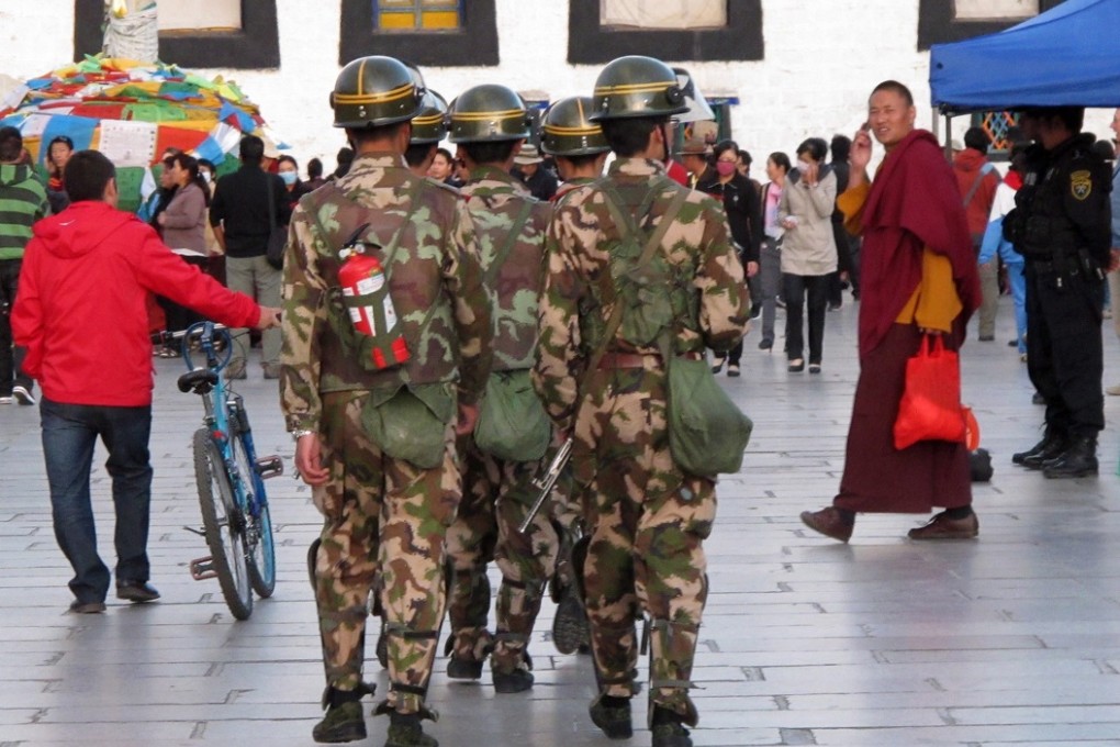 A group of Chinese paramilitary soldiers on patrol in Lhasa, the capital city of the Tibet Autonomous Region. Photo: EPA