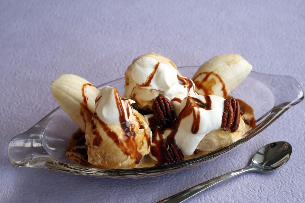 Banana split with butterscotch ice cream, sugar-and-spice pecans and cajeta