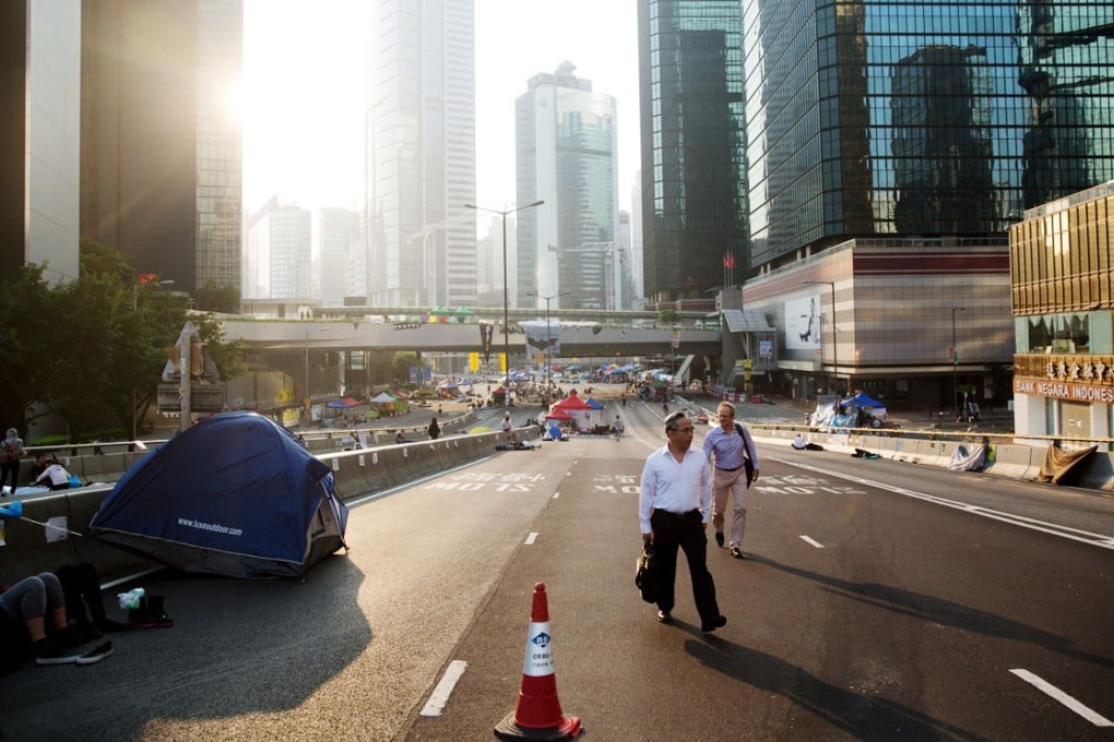 Protesters who blocked roads also cleared Hong Kong's polluted air