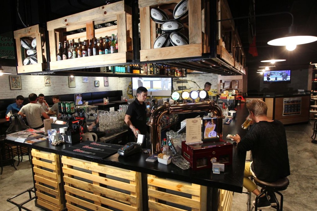 The bar at Eastside Tavern. AmeriCraft Imports distributes craft beers to more than 100 local bars, restaurants, hotels, supermarkets and private clubs. Photo: Nora Tam