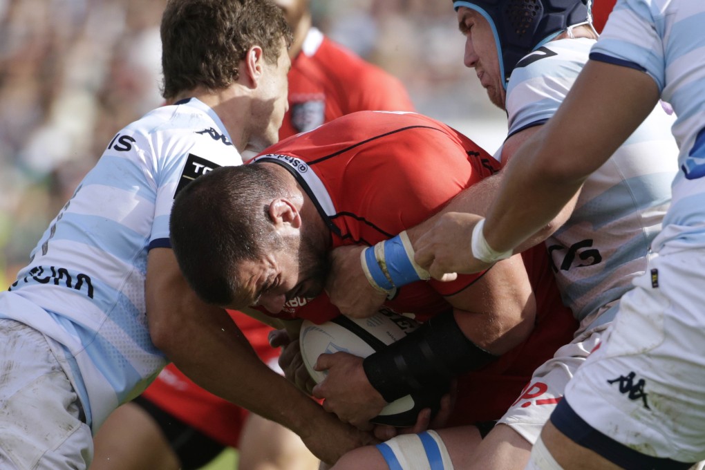 Toulouse's New Zealand hooker Corey Flynn holds the ball during their French Top 14 rugby union match against  Racing Metro 92 at the Yves du Manoir stadium in Colombes, near Paris. Photo: AFP