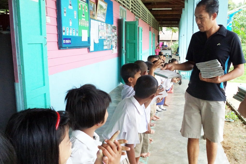 Samadthachai Pungpong and his students at the Borderless School in Ranong province, Thailand.