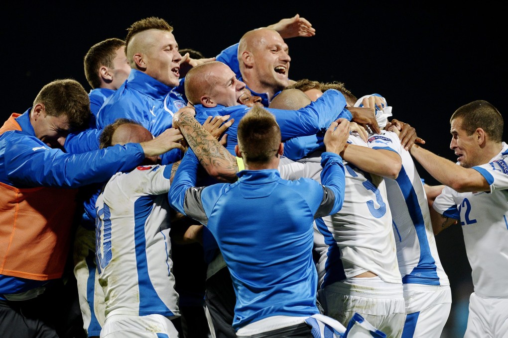 Slovakia celebrate their win. Photo: EPA