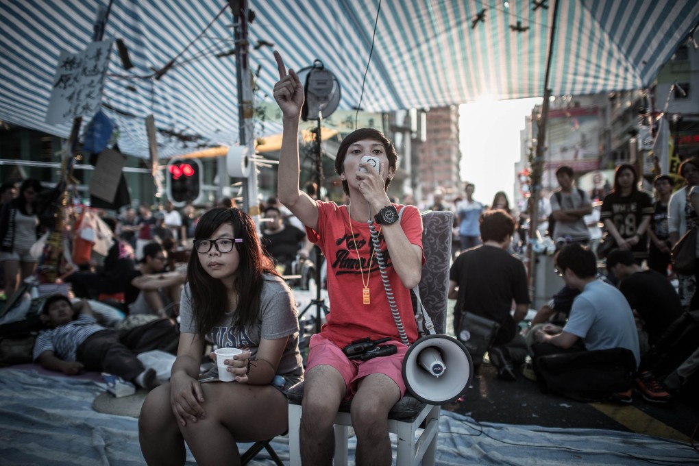 Many protesters reiterate the importance of democracy and freedom, but they are less clear about how to craft a democratic model for Hong Kong. Photo: AFP