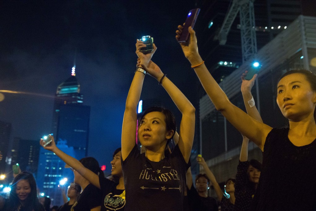 This picture taken on October 1, 2014 shows pro-democracy demonstrators attending a rally in Admiralty, Hong Kong. Photo: AFP