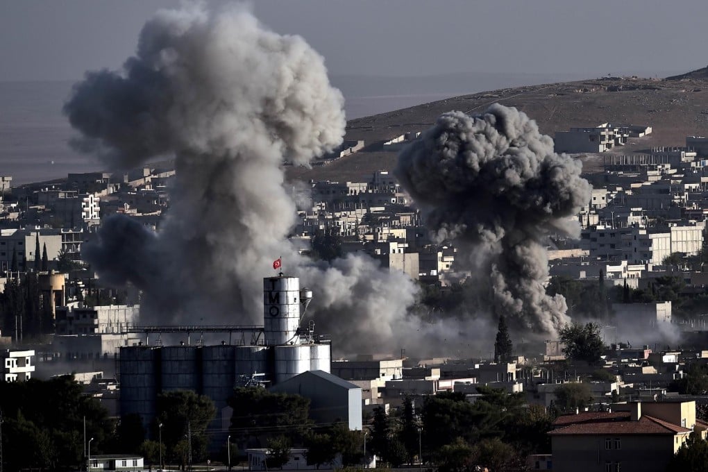 Smoke rises following strikes from the US-led coalition on the Syrian Kurdish town of Kobani. Photo: AFP